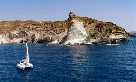 Santorini: Private Day Cruise with a BBQ meal and Open Bar | GetYourGuide