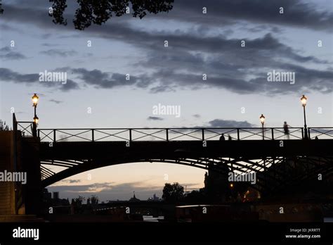 Paris, Unusual Pont des Arts Sunset atmosphere Stock Photo - Alamy