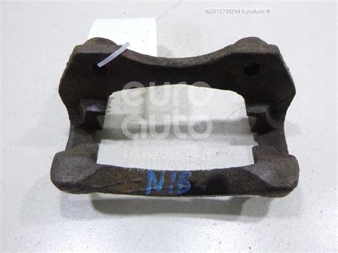 Скоба суппорта переднего левого для Nissan Almera N16 2000-2006 в Москве