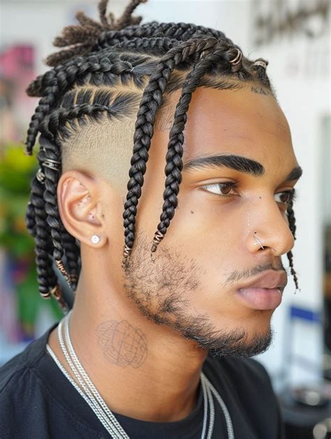 Exploring Creative Braid Ideas For A Black Man Featuring Cornrows