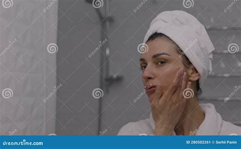 Woman With White Towel On Her Head Massaging Her Face After Shower Stock Video Video Of