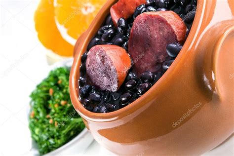 Typical brazilian dish feijoada Stock Photo by ©diogoppr 69740831