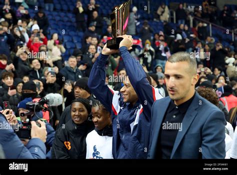 Kylian Mbappe Of PSG Receives A Trophy Celebrating His 201st Goal For