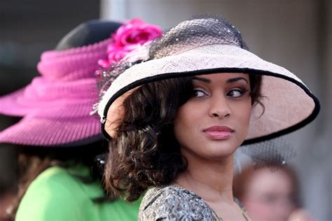 A Woman Wore A Fancy Hat During The Morning Training For The 2013 Why Do Women Wear Hats At