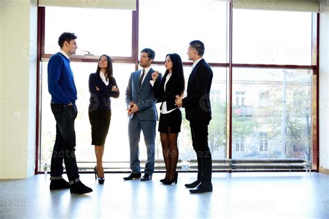 business people talking in the office 864704 Stock Photo at Vecteezy