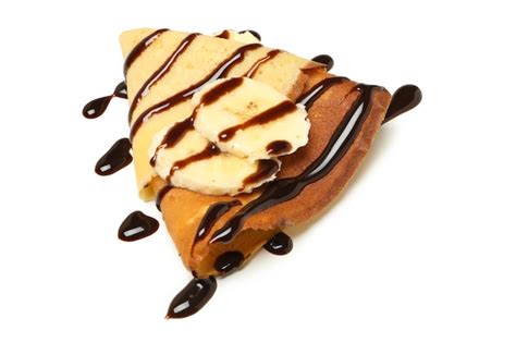 Premium Photo Crepes With Chocolate Sauce And Banana Isolated On