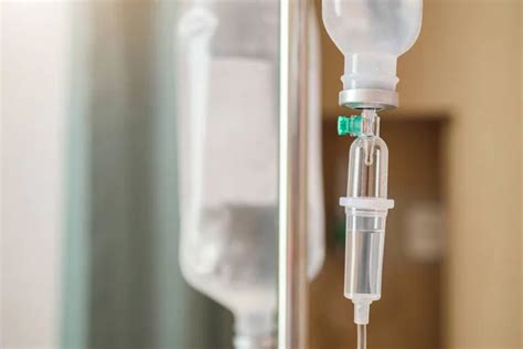 Close Medical Intravenous Drip Hospital Background — Stock Photo © Kwangmoo #702757330