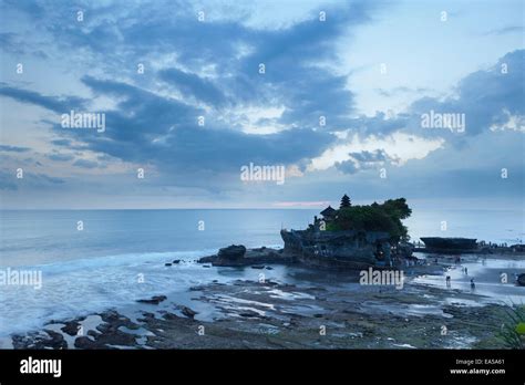 Pura Tanah Lot temple at sunset, Bali, Indonesia Stock Photo - Alamy