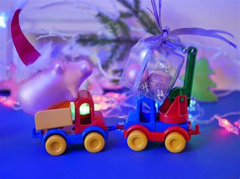 Decorative Seasonal Composition Of Toy Cars Christmas Toys Pigs In