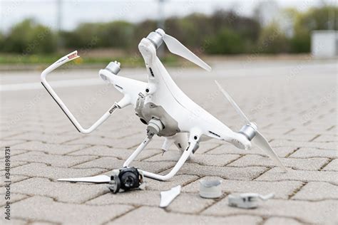 Crashed modern drone and camera after drone accident Stock Photo ...