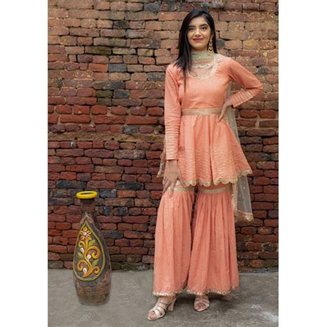 Peach Golden Peach Self Jacquard Kurti Sharara Set At Best Price In