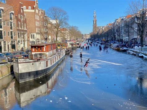 Ice-skating and fun on the frozen canals of Amsterdam