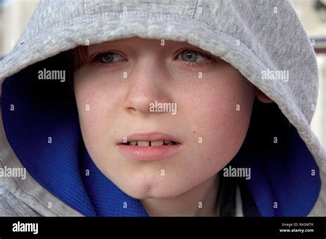 Portrait, boy with a hood Stock Photo - Alamy