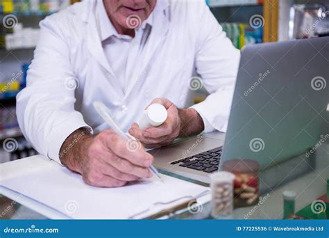 Pharmacist Writing Prescriptions For Medicines Stock Photo Image Of