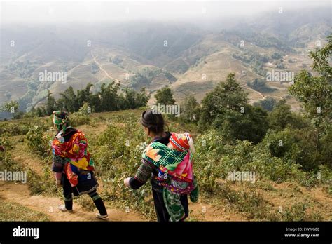 Two Unidentified Vietnamese Women Walk In Sapa Vietnam Stock Photo Alamy