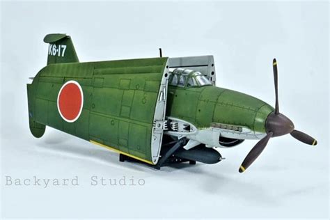 Old Model Green Airplane with Red Circle