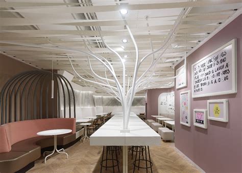 Ippolito Fleitz Group Installs Metal Trees In Natural Food Restaurant