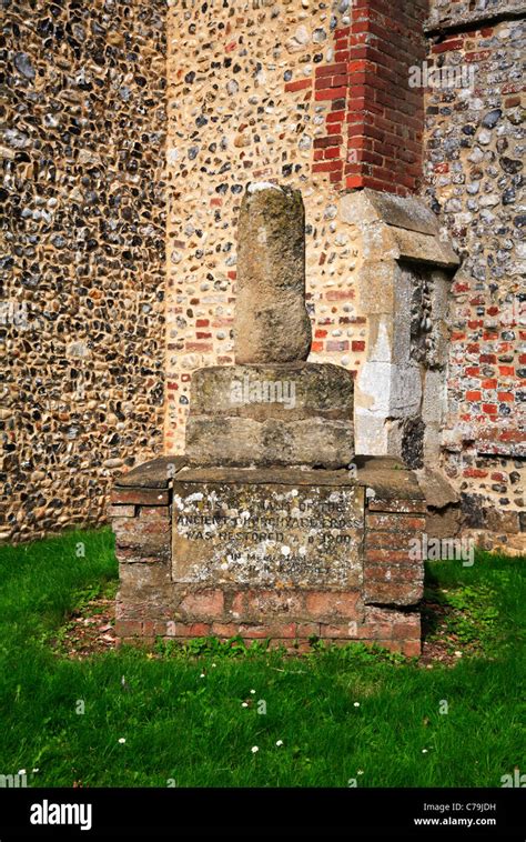 The Remains Of The Churchyard Cross Mounted On A Plinth At The Church