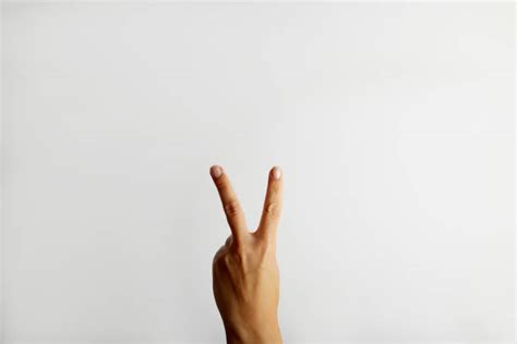 Two Finger Salute Stock Photos, Pictures & Royalty-Free Images - iStock