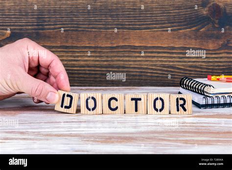 Doctor Wooden Letters On The Office Desk Informative And