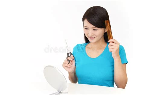 Woman Cutting Own Hair with Scissors Stock Image - Image of health, japanese: 143303057