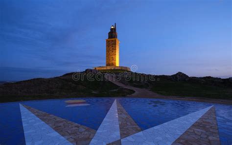 Hercules Tower At Sunset Illuminated With A Compass Rose Pointing Toward The Tower On Stock