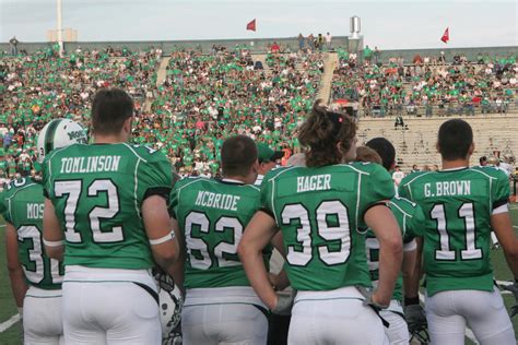 [Team on the sidelines at the UNT v Navy game] - UNT Digital Library