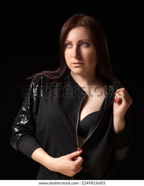 Shy Brunette Woman Unzipping Black Jacket Stock Photo 2249816683