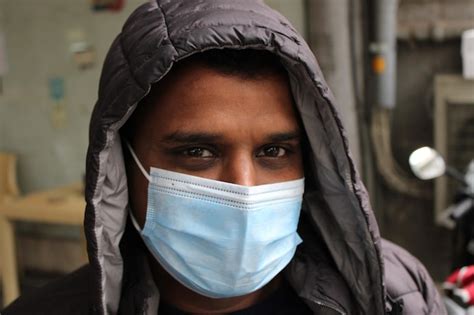 Premium Photo Portrait Of Man Wearing Mask