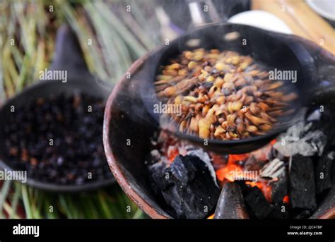 Roasting coffee beans in a traditional Ethiopian coffee ceremony Stock ...