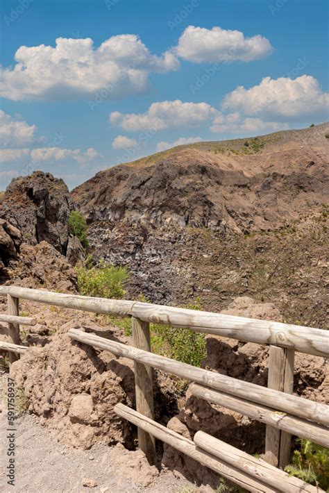 Scenic footpath made of fine sharp volcanic tuff to the top of the Mount Vesuvius volcano, Italy ...