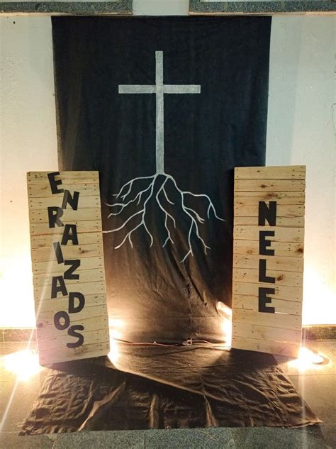 Two Wooden Blocks With Words And A Cross On Them In Front Of A Black