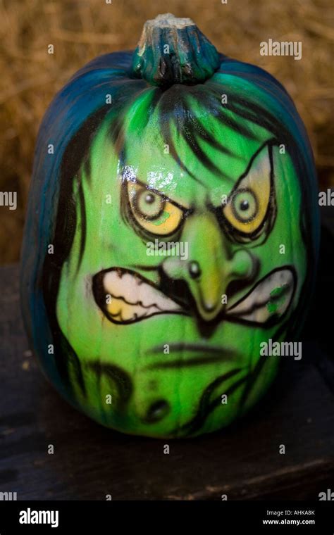 painted witch face on pumpkin Stock Photo - Alamy