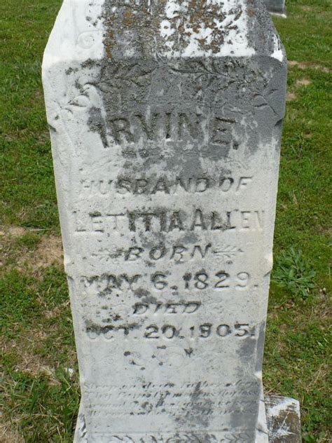 An Old Grave Marker With Writing On It