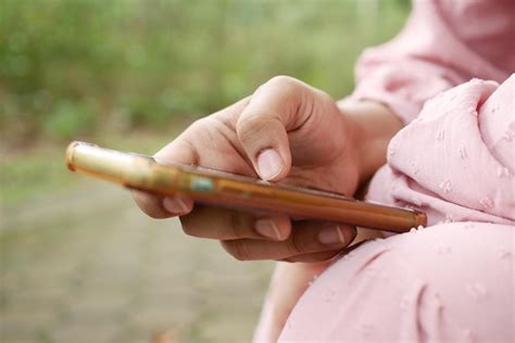 Premium Photo Close Up Of Women Hand Holding Smart Phone