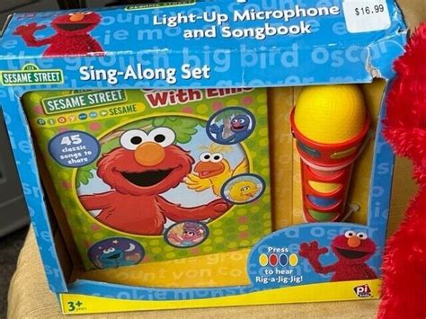 Sesame Street Sing Along Book Nursery Rhymes with ELMO 20 Songs on ...