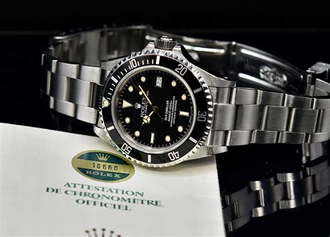 ROLEX SEA DWELLER REF 16660 BOX AND PAPERS Romain Réa