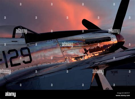 A North American P 51d Mustang Sits On The Ramp At Sunset Stock Photo