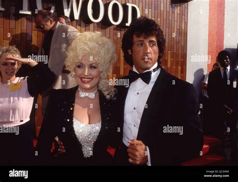 Dolly Parton and Sylvester Stallone at the Rhinestone premiere at the ...