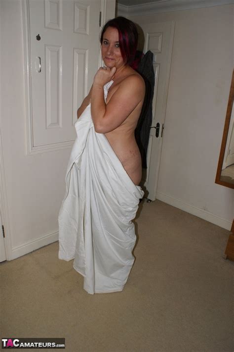 Overweight Redhead Models Completely Naked While In Her Bedroom CoedCherry