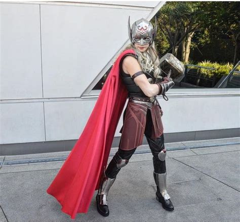 A Woman Dressed As Thor From The Avengers