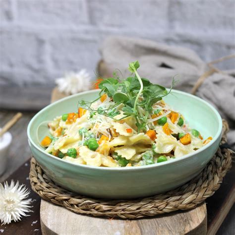 Farfalle Mit Feiner Parmesan K Rbisssauce Erbsen Und Zitronen L