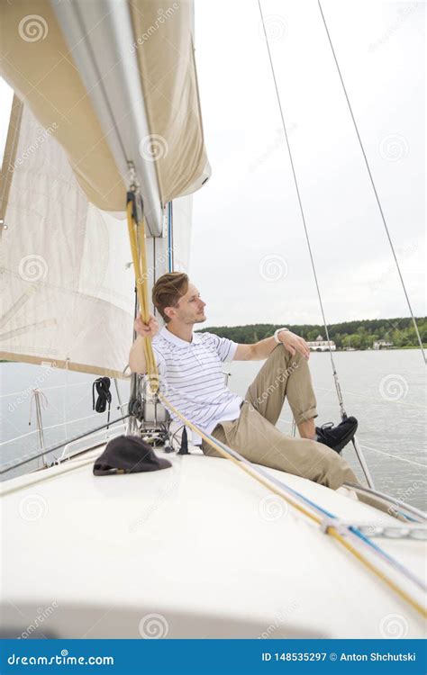 Handsome Young Man on Yacht Stock Image - Image of nautical, away ...