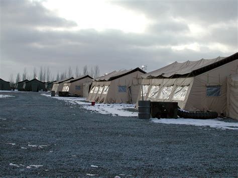 The sun sets on tent-city at Manas International Airport, Ganci Air ...