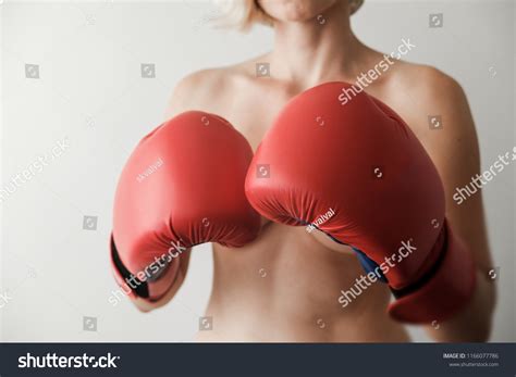 Стоковая фотография 1166077786 Naked Woman Red Boxing Gloves Sexy