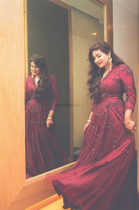 photo  floor length wine colored gown  engagement wine colored