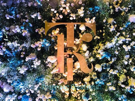 Flower Bed Backdrop With Initials Of The Bride And Groom Wedding