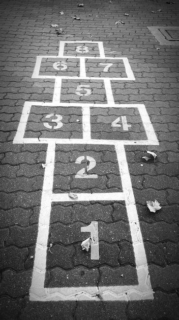 Premium Photo Close Up Of Hopscotch Grid