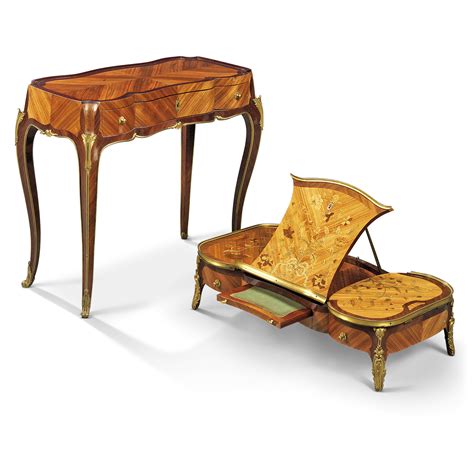 A LOUIS XV ORMOLU MOUNTED TULIPWOOD KINGWOOD AMARANTH AND FLORAL