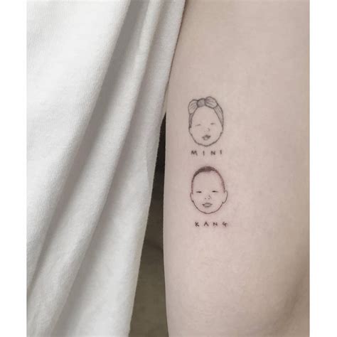 Minimalistic Baby Portraits Tattooed On The Inner Arm